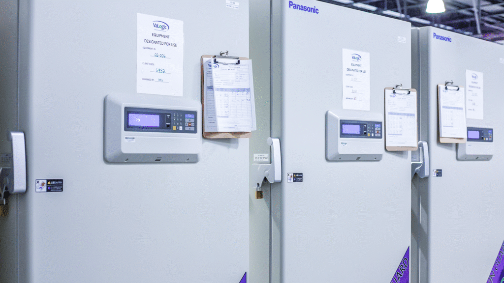 Panasonic branded cleanroom equipment with clipboards and signs reading “VaLogic EQUIPMENT DESIGNATED FOR USE”